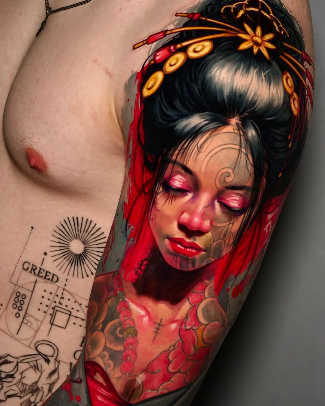 Color realism portrait tattoo of a woman with a floral crown