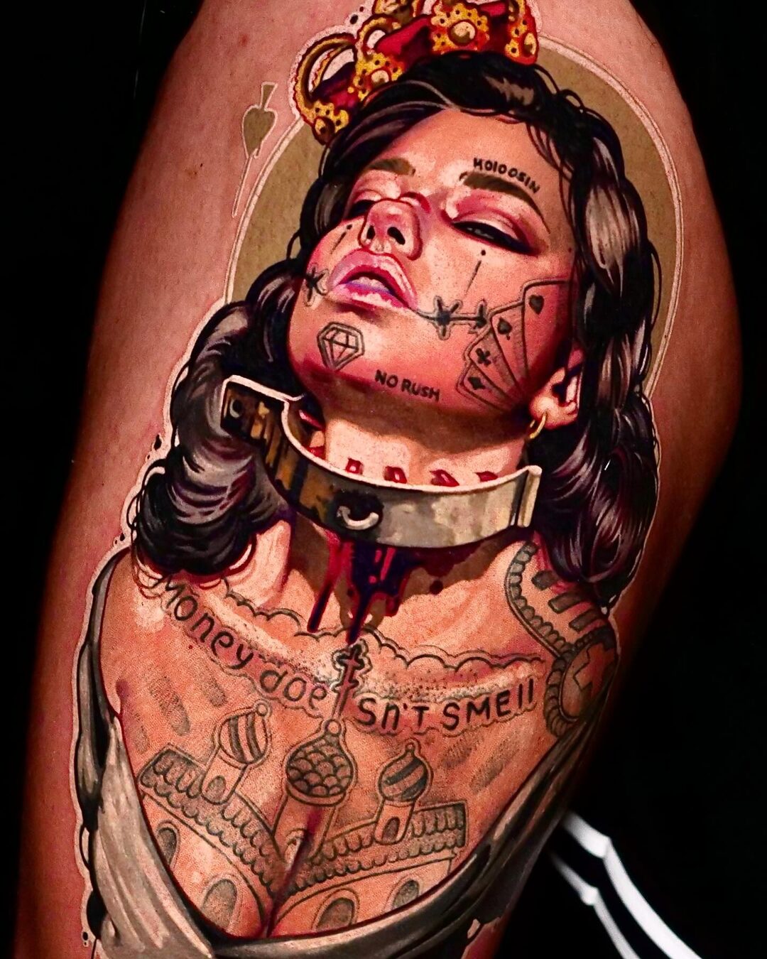Color realism portrait tattoo of a man framed in ornamental detail